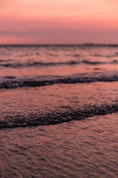 The waves lapping during the day
